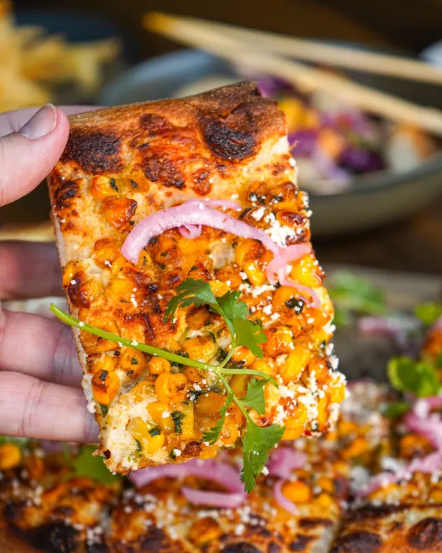 🌽 Street Corn Summer Scorcher 🍕

When the temps are high, so is our flavor game. Meet the Street Corn Pizza — a smoky, cheesy, tangy dream topped with crema verde, cotija, and just enough heat to match this New England heatwave. 🌶️☀️

Pull up a patio seat, grab a cold drink, and let this pizza bring the right kind of heat. 🔥 Available now at Tavern!
